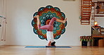 Woman, mat and handstand at home for yoga with leggings,  wellness and health or mindset.  Female, floor and exercise in house for zen or peace, spiritual and movement with stretching in India