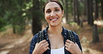 Hiking, smile or face of woman in forest, woods or nature for peace, trekking or outdoor adventure. Portrait, relax or happy hiker walking in park or Mexico for travel or wellness on holiday vacation
