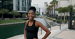Laughing, face or black woman in city for fitness, outdoor workout or training for cardio exercise.  Runner, funny joke or happy sports person resting with smile to relax on break in Miami, Florida