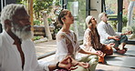 Meditation, club and people with lotus hands on a studio floor for wellness, breathing or mindfulness. Balance, zen and group with peace, diversity and holistic exercise for soul, aura and healing