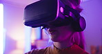 Gaming, virtual reality goggles and woman with controller at night for entertainment, online games and esports. Gamer, neon light and person with vr glasses for metaverse, cyber world and competition