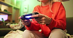 Gaming, sofa and hands of teenager with controller for fun, playing and metaverse in living room. Video game, remote and person on couch online subscription, electronics and virtual reality esports
