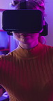 Vr, gaming and woman relax in home with headset, technology and online streaming experience. Virtual reality, video game and girl explore creative software with futuristic esports glasses with app