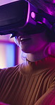 Vr, gaming and woman relax in home with headset, technology and online streaming experience. Virtual reality, game and girl explore creative software with closeup of futuristic esports glasses