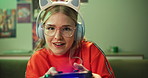Headphones, face and woman playing game in house for competition, video and online rpg. Controller, girl and person on console technology for entertainment with neon light in portrait at apartment