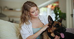 Love, relax and woman on sofa with dog for company, commitment and loyalty with animals on couch. Pet care, woman and German Shepard in living room for bonding, support and smile together in home