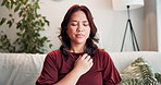 Healing, tapping and woman with reiki sofa sofa for anxiety, mental health and holistic healing. Video call, portrait and Asian life coach on virtual consultation for body energy wellness at home.