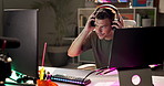 Influencer, headphones and frustrated man with recording of podcast, tired and burnout at night by desk. Creative person, technology and digital glitch by sound equipment for and upset at 404 error
