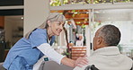 Happy woman, nurse and patient with wheelchair in care, support or hospital at old age home. Senior caregiver or scrub with smile for helping person with a disability, responsibility or healthcare