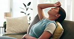 Woman, calm and relax on couch in home on Saturday afternoon for weekend break, eyes closed and discomfort of stomach or abdominal pain. Girl, rest and menstruation cramps on sofa and uncomfortable.