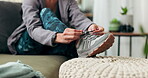 Woman, runner and lacing up shoes in home, morning jog for wellness and cardio fitness health. Exercise, trainers and workout clothes for comfort and support, vitality and running sport for athlete