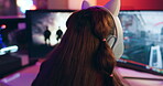 Woman, gaming and headphone on online competition, streaming on computer screen for esports in home. Internet, content creator and genz streamer with female person in bedroom with game subscription