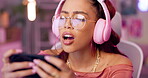 Woman, headphones and smartphone for video game with mistake, streaming for contest and digital world. Mobile app, connection and esports with tech, internet and entertainment for gamer with fail