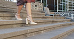 Walking, city and business woman on stairs for morning commute, traveling and journey to office. Professional style, fashion and legs of person in urban town for career, working and job opportunity