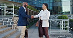 Thank you, handshake and business people in city meeting for deal, offer or contract negotiation. Welcome, hiring and team shaking hands for onboarding collaboration, partnership or b2b networking