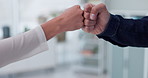 Closeup, business people and fist bump with greeting, agreement and hand gesture in a modern office. Staff, coworkers and teamwork with partnership and b2b deal with collaboration and cooperation