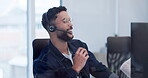 Headset, telemarketing agent and man by computer in office, workspace and work in call center for telecommunications career. Male person, talking and customer service agent with tech for consultation