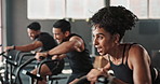 Fitness, friends and cycling with endurance at gym for stability, health and wellness with sports. Group of people, men and woman with exercise equipment, machine and workout for cardio as hobby