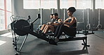 People, rowing machine and gym workout for exercise challenge or fitness teamwork, friends or cardio. Men, woman and healthy training at sports centre together or athlete goals, wellness or endurance