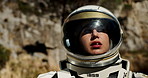 Astronaut, environment and explore mountain for mission adventure or research trip, planet earth or travel. Person, helmet and outdoor journey in spacesuit for expedition discovery, view or global