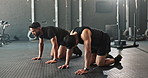 Fitness, mountain climbers and athletes in gym, exercise and strong wellness for workout class. Fatigue, high five and cardio for strength and muscle, health club and abdominal physical activity