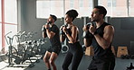 Squats, weights and coach in gym for fitness, exercise or workout with cycle for sport. Partnership, personal trainer or people in gymnasium for wellness, training or health with partnership together