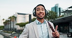 Outdoor, business and man with headphones, dancing or excited with celebration or listening to radio. Person, employee or entrepreneur with headset or movement with energy or sound with app for audio