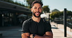 Man, fitness and smile in sportswear with morning walk or run for healthy living in New York. Portrait, confident and happy for exercise or wellbeing in summer, hot weather and arms crossed
