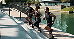 Fitness friends, workout and running on stairs for cardio, increasing strength and endurance while training. People, men and woman exercise for health, body positivity and teamwork in sports