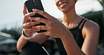 Hands, woman and smartphone outdoor for exercise app, communication and scroll social media for workout tips. Using phone on fitness break, sports blog with connectivity and happy with online chat