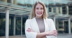 Smile, funny and arms crossed with business woman outdoor at office in city for comedy or humor. Portrait, happy and street with employee laughing in urban town for carefree reaction to good news