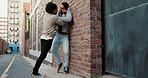 City, violence and men in street fight with conflict, battle and disagreement with aggression, punching and drama. Argument, bullying and angry friends in urban brawl in alley with frustrated danger