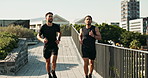 Outdoor, men and friends running, watch and check for time, jogging and exercise with fitness. City, athlete and runner with energy for workout, training and wellness for healthcare of male person