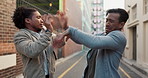 City, conflict and men in silly fight with violence, battle and disagreement with hitting, aggression and self defence Argument, bullying and goofy friends in street brawl in alley with funny danger