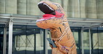 Mascot, tablet and city with checklist, urban office building and documents for work. Costume, inflatable dinosaur and fun for entertainment, company culture and prank with funny business joke