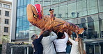 People, cheer or team building in motivation, success or mascot in crowd surfing by bonding together. Corporate workers, fun or celebration of startup, business or company solidarity in city plaza