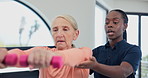 Old woman, physiotherapy and dumbbell workout for rehabilitation or arm mobility consultation, recovery or joint pain. Elderly person, assessment and muscle injury for wellness, progress or support