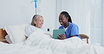 Nurse, tablet and senior woman in hospital bed for results, healthcare and good news. Medical, caregiver and elderly patient talking for advice, discussion and consultation for health examination 