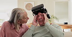 Senior couple, headache and technology for virtual reality, online streaming or gaming with people at home. Partners, elderly woman and man with stress from esports, video or headache from cyber game