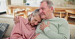 Sad, hug and senior couple with support and empathy for partner with depression in home from cancer. Elderly, man and embrace woman with care, kindness or crying from grief in retirement or marriage