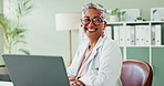 Happy, face and doctor with laptop for research, analysis and results with happiness in medical career. Professional, healthcare expert and surgeon with technology in hospital, clinic and facility