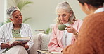 Discussion, information and group of friends in book club for conversation, review or perspective in living room. Talking, literature and women with coffee for story, learning and knowledge in home