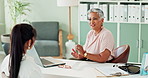 Senior woman, patient and doctor with laptop for results, analysis and research in medical career. Female person, healthcare expert and surgeon with technology in hospital, clinic and consultation