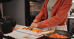 Hands, cooking and live streaming in kitchen for recipe, tutorial and career in content creation. Person closeup with chopping board and vegetables for meal, dish or lunch for online blog with tripod