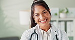 Woman, doctor and smile at office for health care in hospital, excited and satisfied with career. Female person, clinic and portrait with happiness as medical professional or expert in confidence 