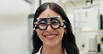 Trial, frame and patient at optometrist for vision with eye exam, consultation and happy with test results. Woman, optical tool and ophthalmology for retina strength, lens refraction and eyesight
