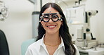 Trial, frame and woman at optometrist for vision with eye exam, consultation and happy with test results. Patient, optical tool and ophthalmology for retina strength, lens refraction and eyesight