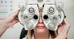 Woman, phoropter and eye exam with optometrist for vision with refraction consultation or prescription glasses. Patient, optical tool and ophthalmology for retina strength, lens check and eyesight
