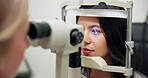 Asian woman, eye or slit lamp in glaucoma, exam or ophthalmology as visual, healthcare or treatment. Optometrist, patient or led light as medical technology to assess lens in specialist consultation