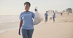 Face, beach or happy black woman with plastic bag for earth day, sustainability or ocean cleaning project. Recycle, sustainability and portrait of volunteer at sea for NGO, accountability or charity